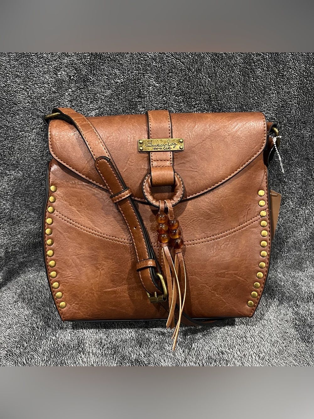 American Rag Cie studded brown faux leather crossbody bag